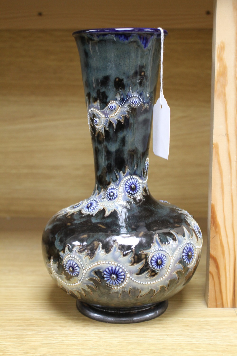 George Tinworth for Doulton Lambeth, a Persian shape bottle vase, dated 1880,